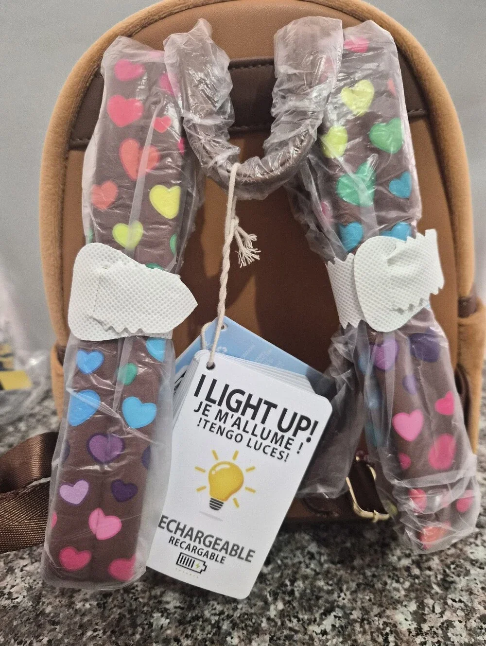Loungefly Care Bear Plush Backpack with Pink Ligh Up Heart.